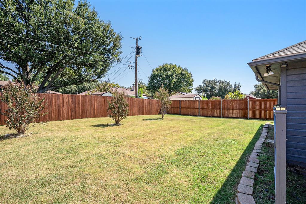 602 McAnear Street Cleburne, TX 76033 - Photo 23 of 27 a swimming pool with wooden fence