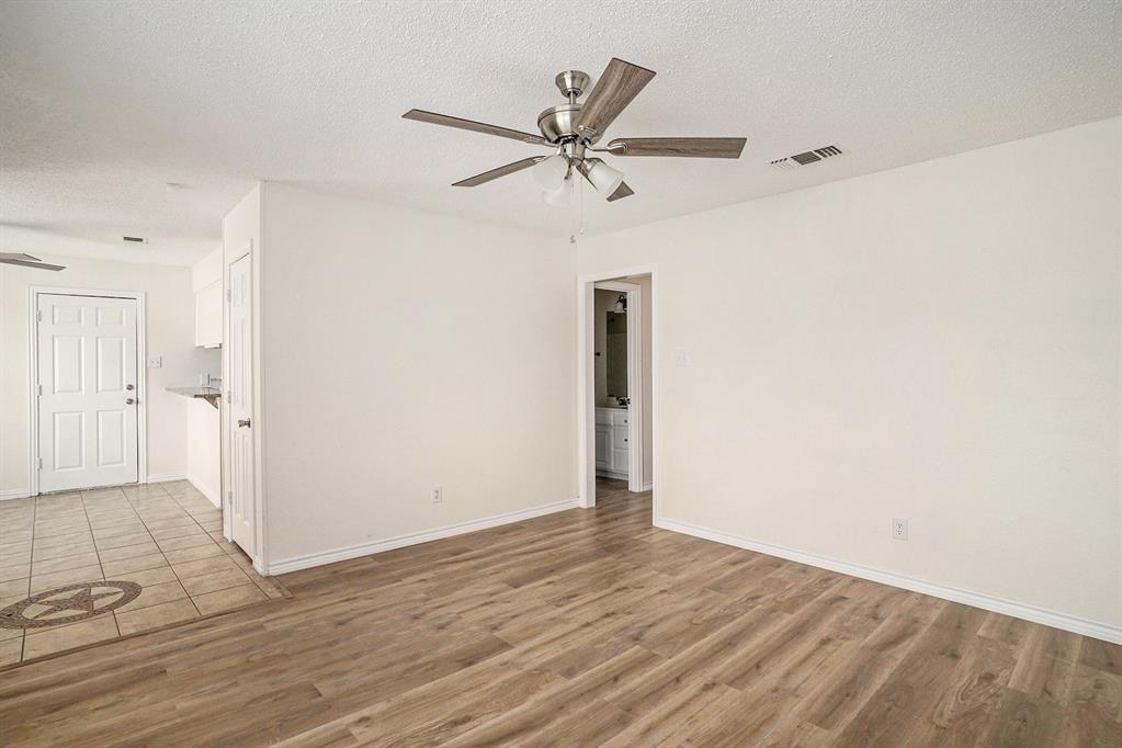 602 McAnear Street Cleburne, TX 76033 - Photo 6 of 27 a view of an empty room