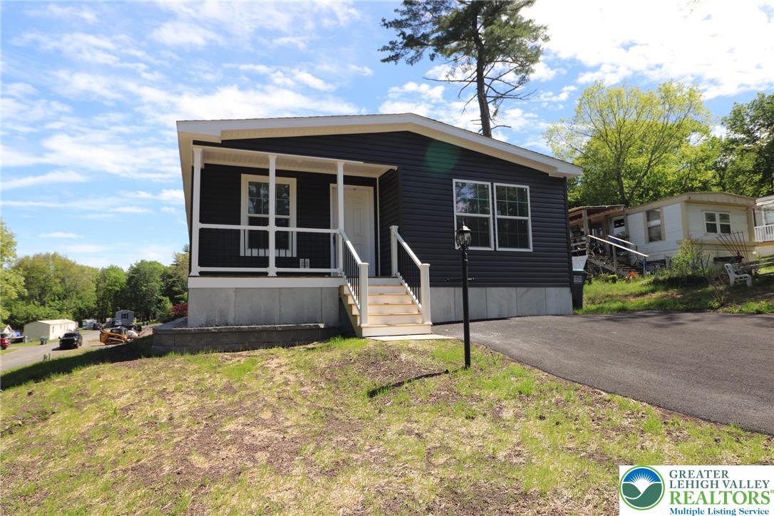 5020 Old Timber Road Stroudsburg, PA 18360 - Photo 28 of 32 a house with trees in the background