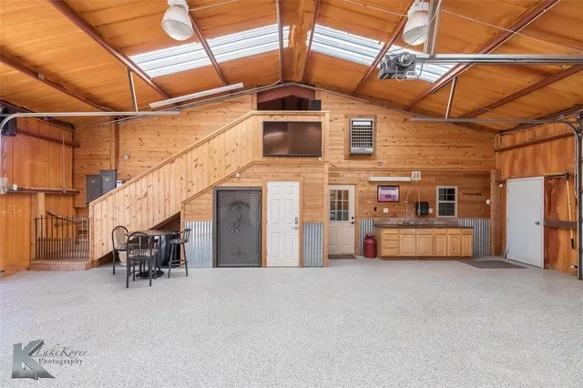 a view of a car park in front of house