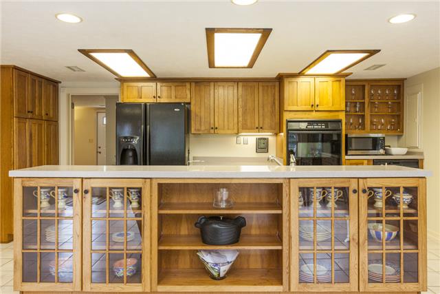 4444 Manners Road Lebanon, TN 37087 - Photo 5 of 20 a kitchen with stainless steel appliances granite countertop a stove and cabinets