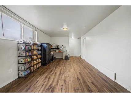 a view of a livingroom with wooden floor