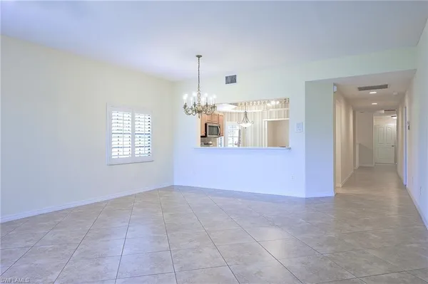 a view of a room with sliding windows