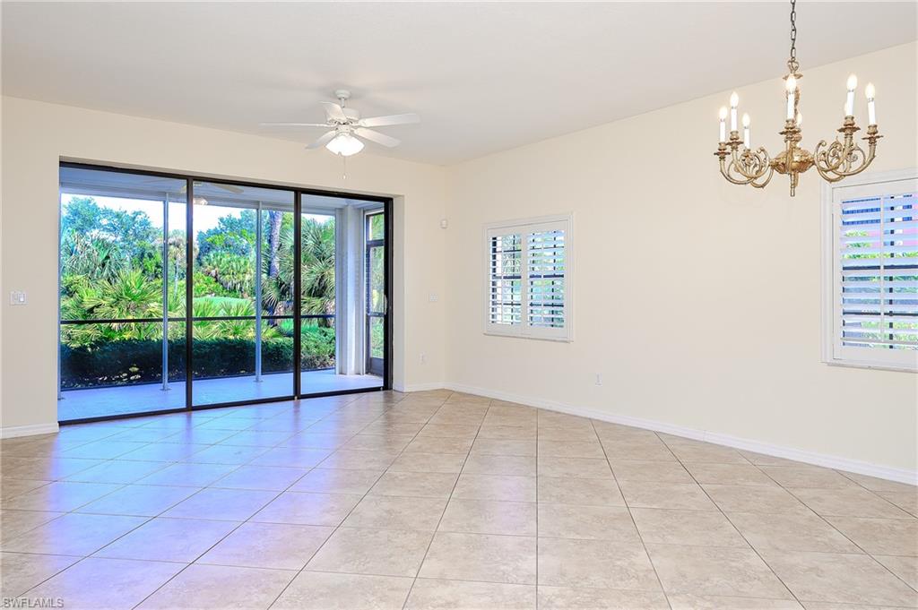 5805 Grande Reserve Way, Unit 1102 Naples, FL 34110 - Photo 14 of 38 a view of livingroom with window