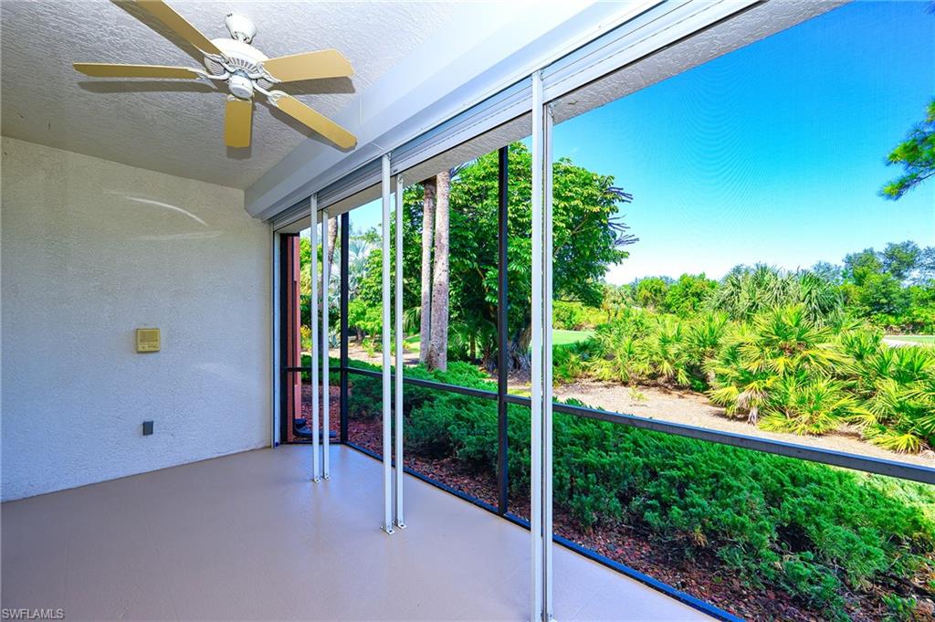 5805 Grande Reserve Way, Unit 1102 Naples, FL 34110 - Photo 27 of 38 a view of a room with a large window