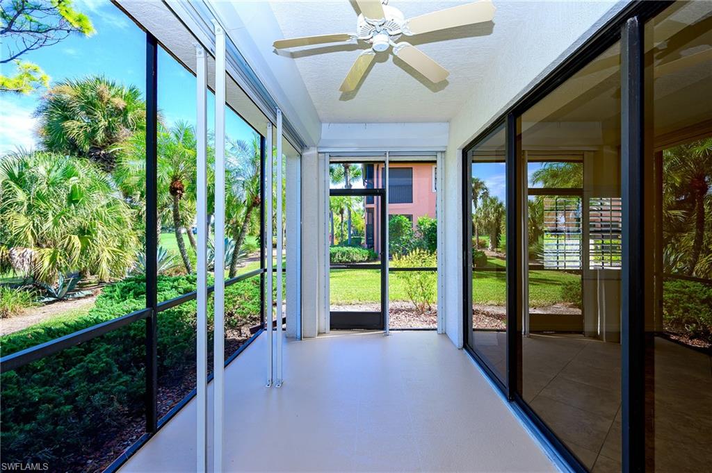 5805 Grande Reserve Way, Unit 1102 Naples, FL 34110 - Photo 28 of 38 a view of an entryway with garden