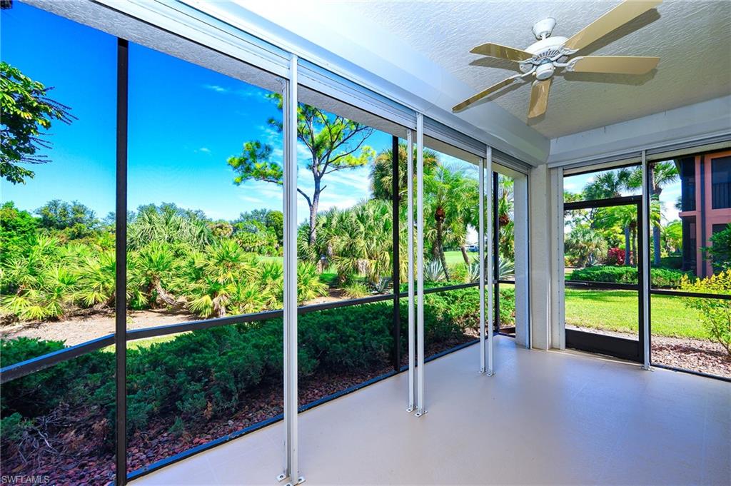 5805 Grande Reserve Way, Unit 1102 Naples, FL 34110 - Photo 29 of 38 a view of a garden from a window