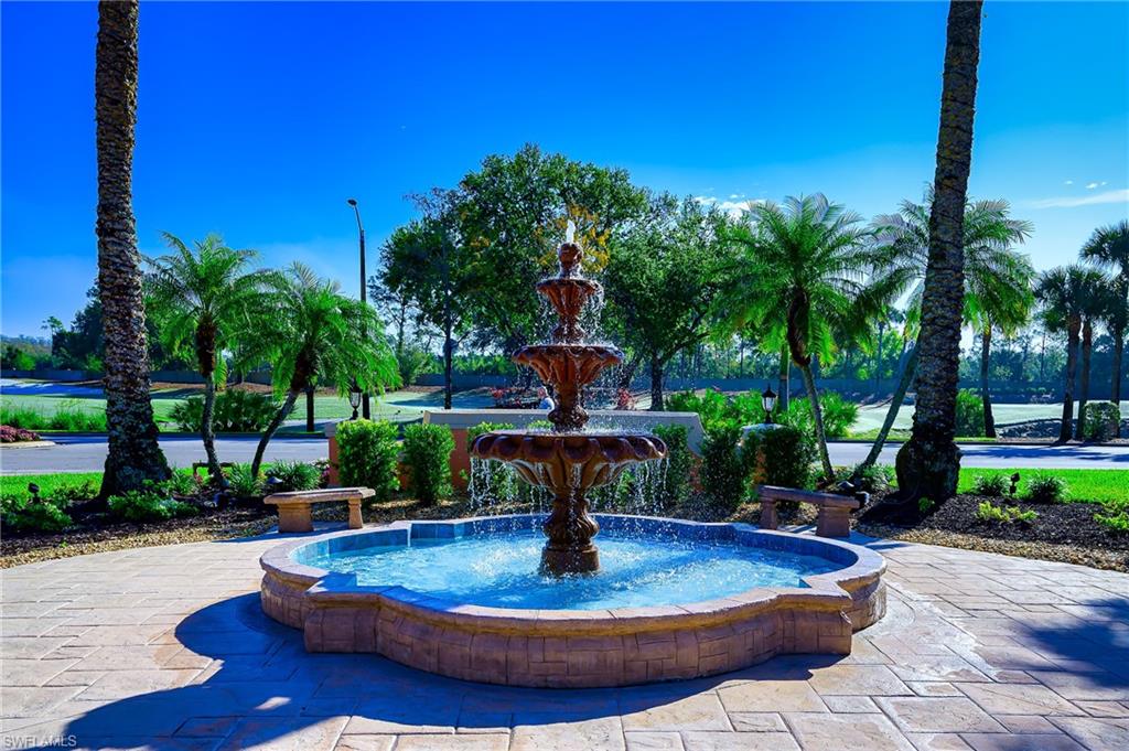 5805 Grande Reserve Way, Unit 1102 Naples, FL 34110 - Photo 35 of 38 a swimming pool with outdoor seating