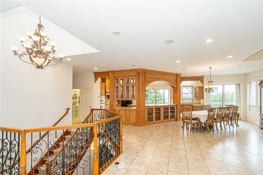 208 Brockway Road Chehalis, WA 98532 - Photo 2 of 40 a view of a dining room with furniture wooden floor and chandelier