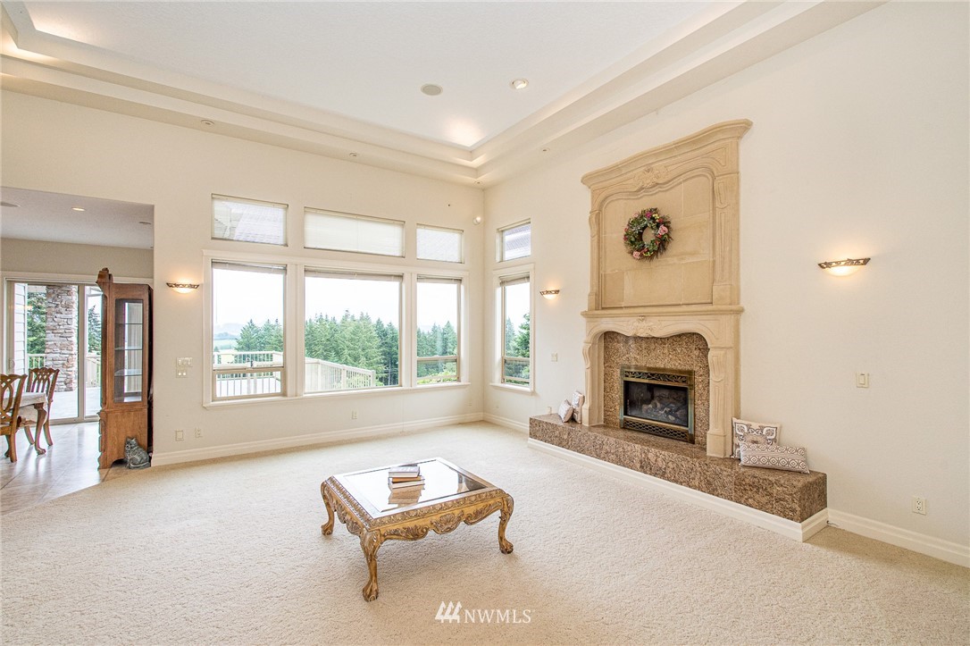 208 Brockway Road Chehalis, WA 98532 - Photo 7 of 40 a living room with furniture and a fireplace