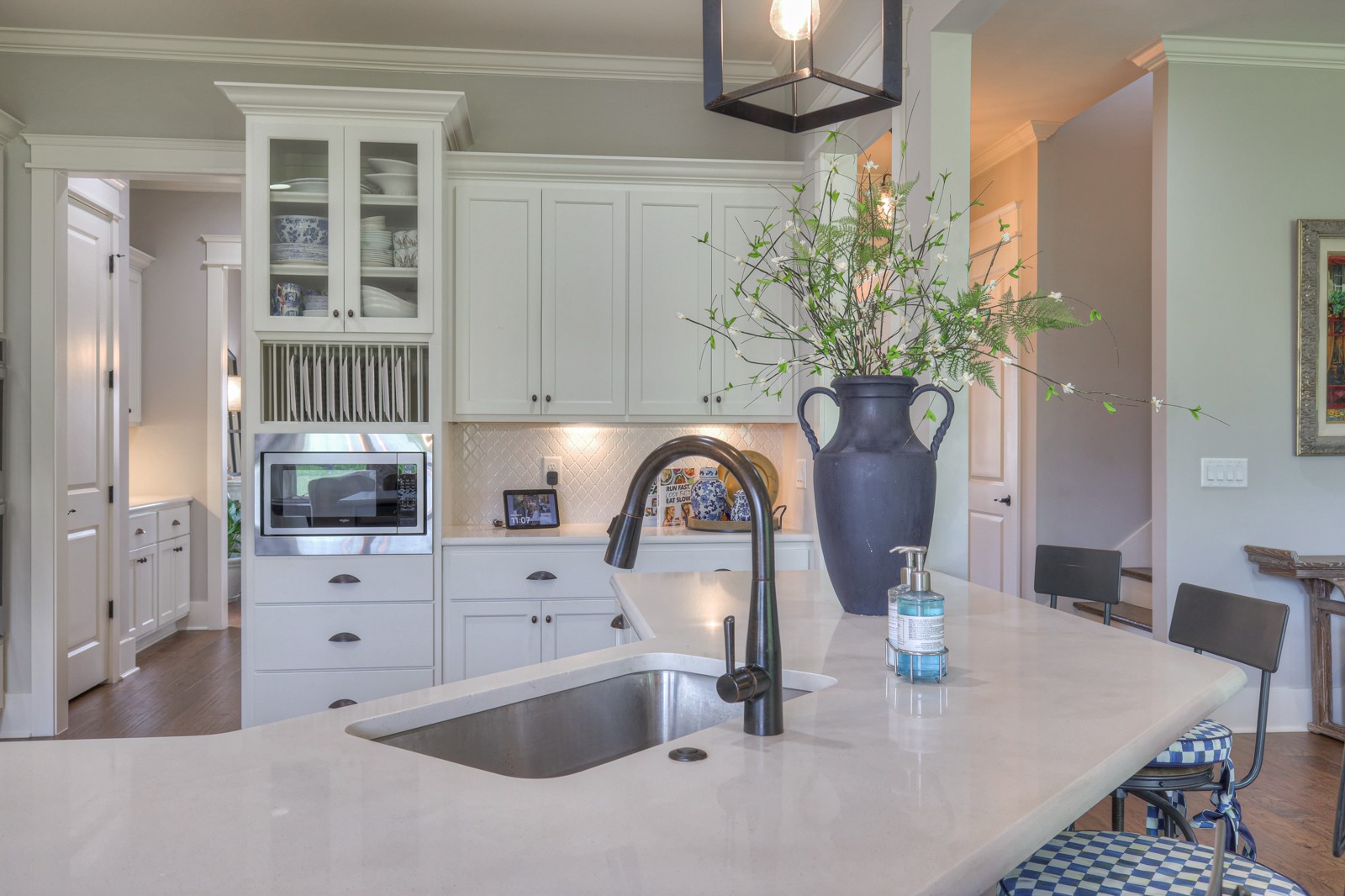 255 Circuit Road Franklin, TN 37064 - Photo 2 of 56 Glass front cabinets and plate holder add to the ease and clean lines of this kitchen.