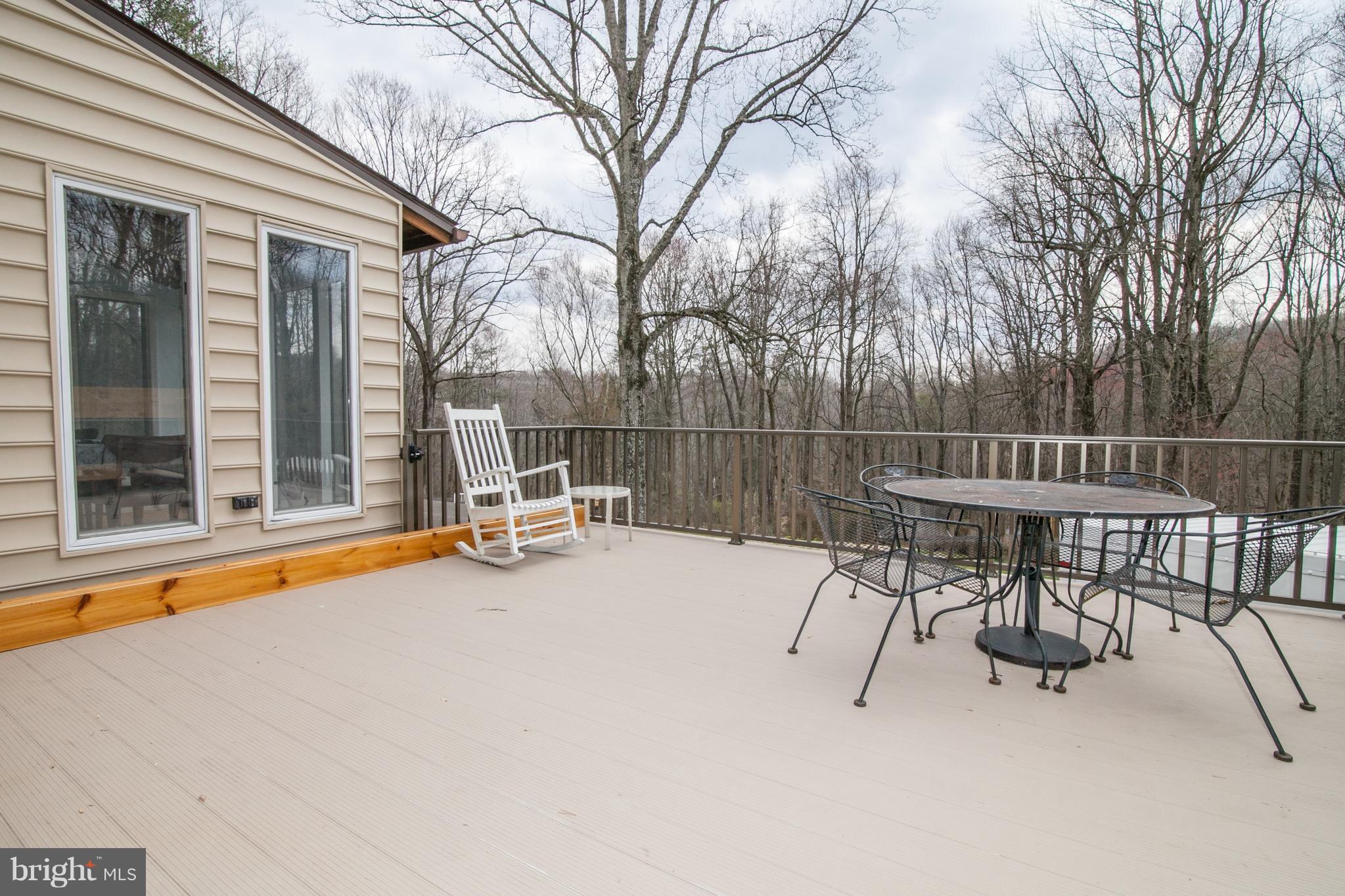 3046 Rocks Road Jarrettsville, MD 21084 - Photo 11 of 26 Large deck off of the living and dining rooms