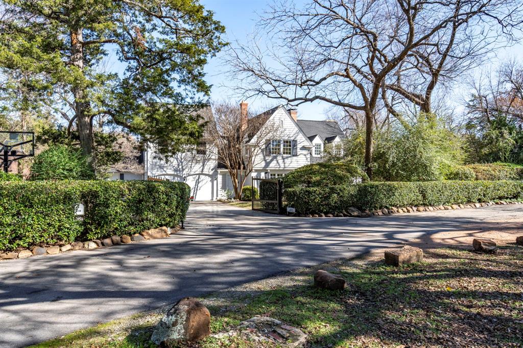 8530 Jourdan Way Dallas, TX 75225 - Photo 2 of 39 View of asphalt driveway