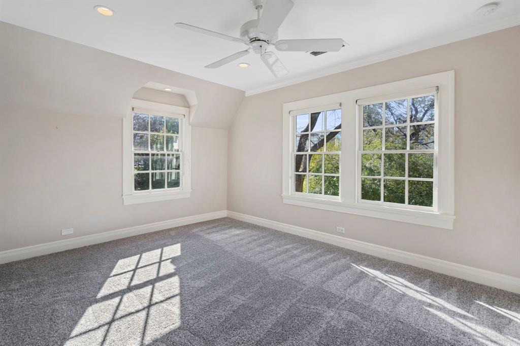 8530 Jourdan Way Dallas, TX 75225 - Photo 29 of 39 Carpeted spare room featuring recessed lighting, lofted ceiling, and a ceiling fan