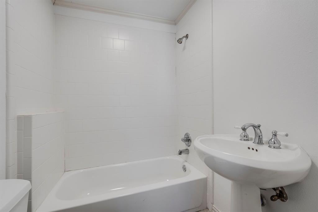 8530 Jourdan Way Dallas, TX 75225 - Photo 31 of 39 Full bathroom with bathtub / shower combination and ornamental molding