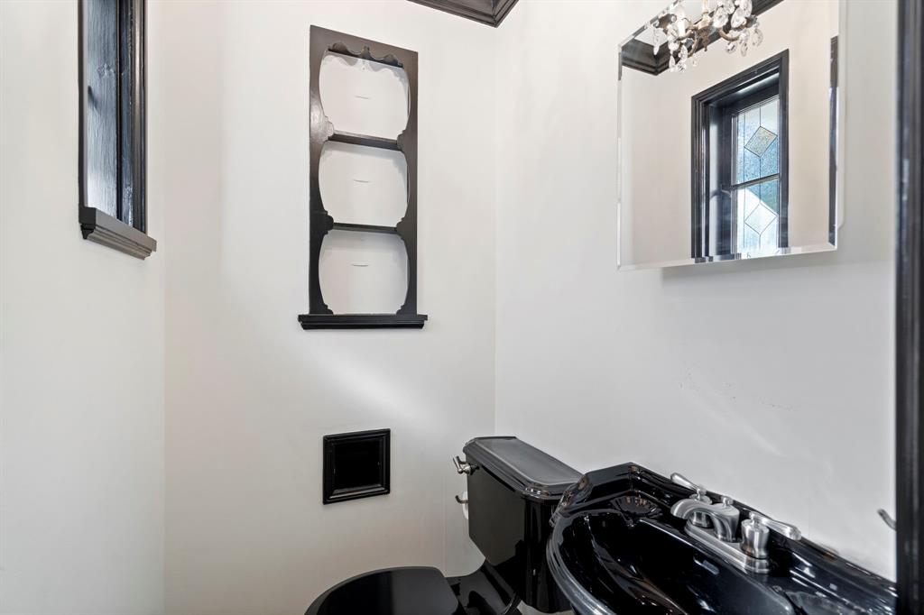 8530 Jourdan Way Dallas, TX 75225 - Photo 32 of 39 Bathroom featuring toilet and a sink
