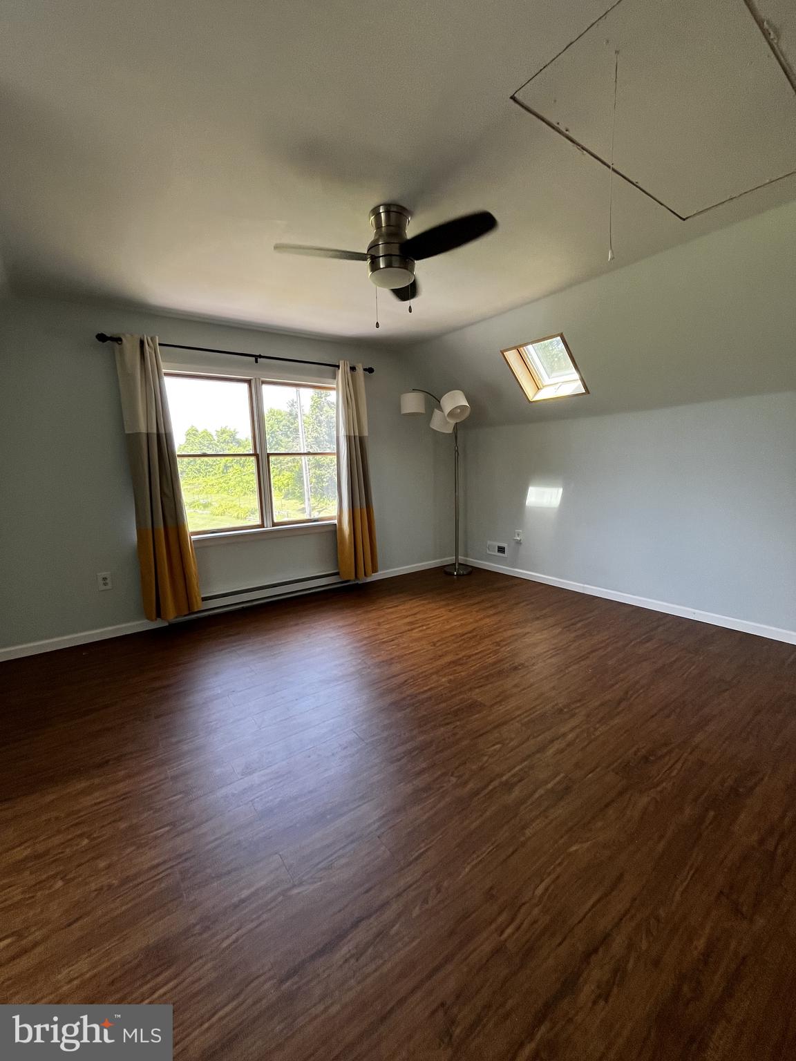 210 Elk View Road North East, MD 21901 - Photo 30 of 64 an empty room with wooden floor and windows