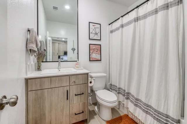 a view of storage and utility room with washer and dryer