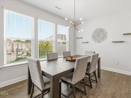 a bathroom with a sink a mirror and a toilet
