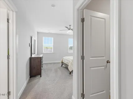 a bathroom with a shower and toilet