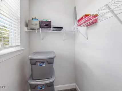 a view of a house with backyard and garden