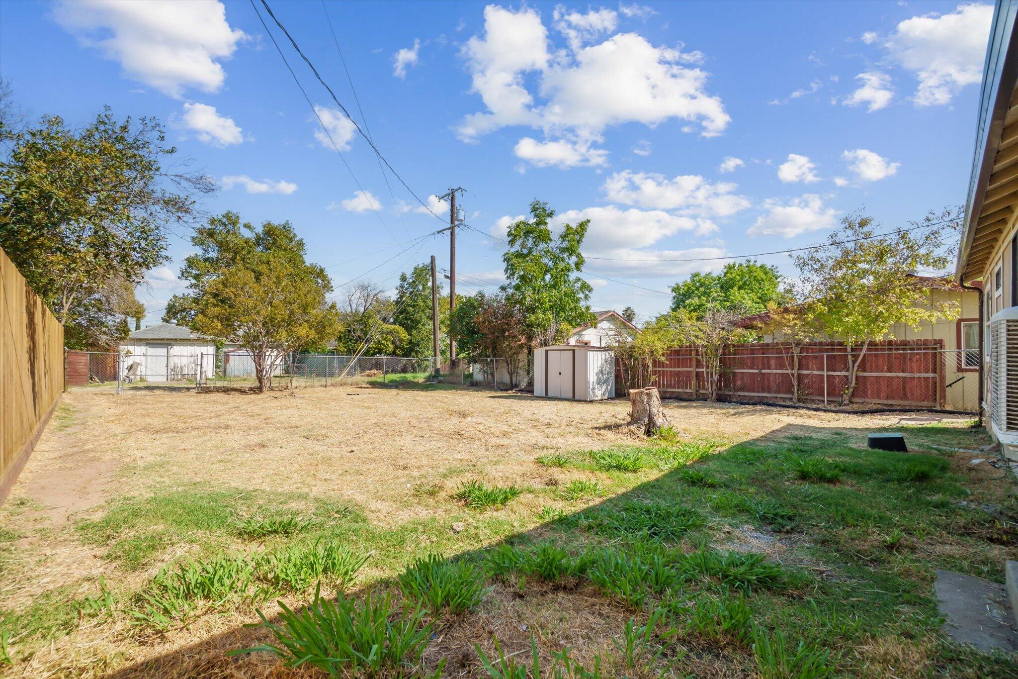 1450 Bulkeley Street Red Bluff, CA 96080 - Photo 18 of 21 a backyard of a house with lots of green space
