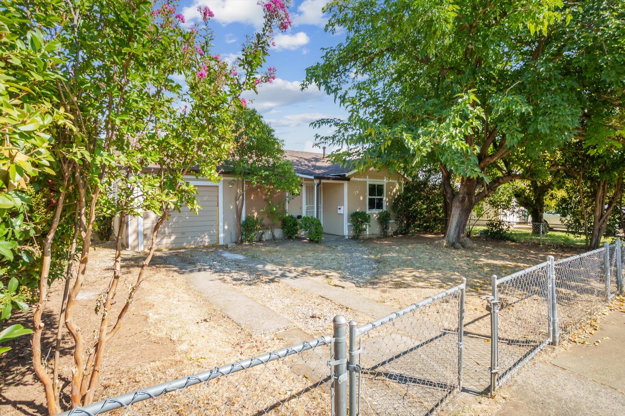 1450 Bulkeley Street Red Bluff, CA 96080 - Photo 20 of 21 a view of a backyard with a tree