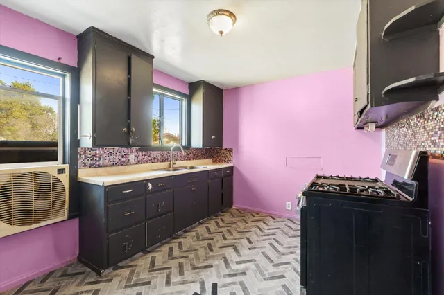 a bathroom with a sink a vanity and a mirror