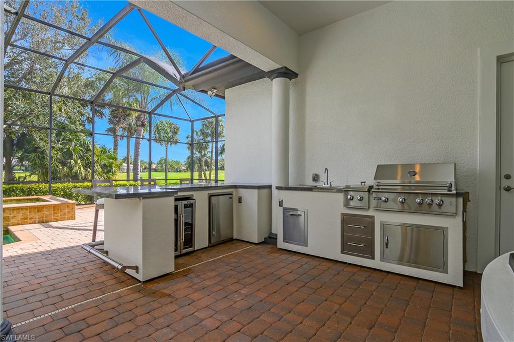 7420 Byrons Way Naples, FL 34113 - Photo 40 of 50 Grilling area/Summer kitchen