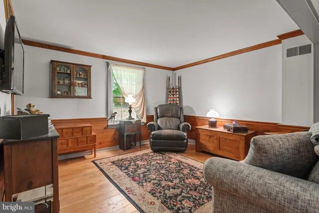 a living room with furniture and a couch