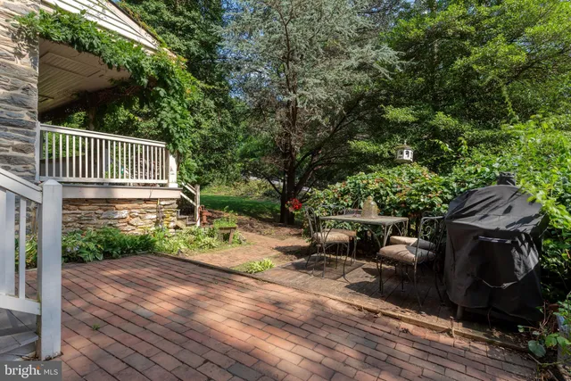an aerial view of a garden with houses
