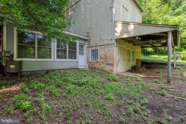 a view of a field with a trees