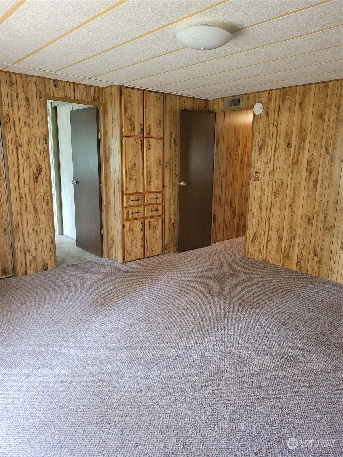 119-13 Peterson Road, Unit 13 Chehalis, WA 98532 - Photo 13 of 31 a view of an empty room with a window