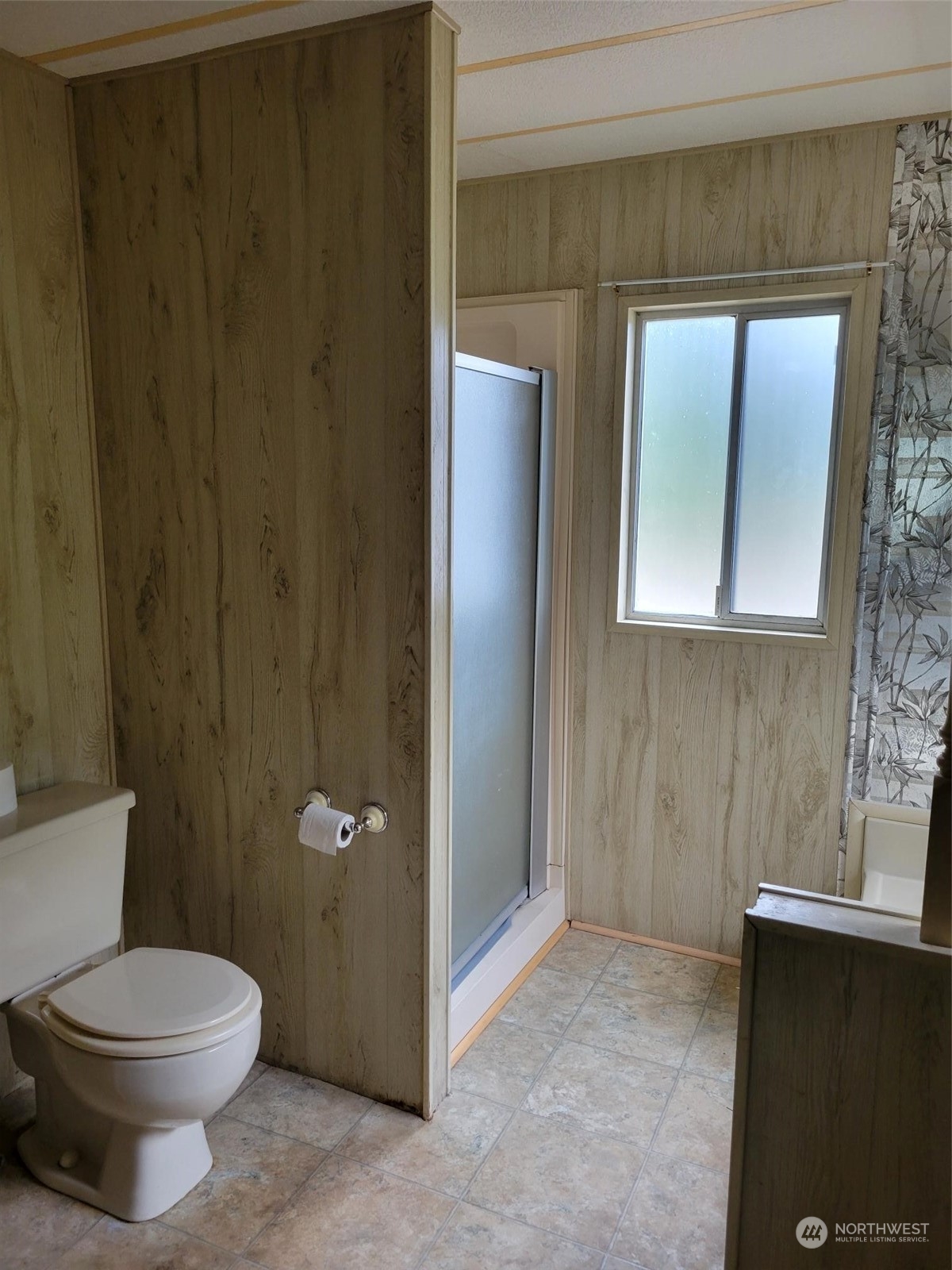 119-13 Peterson Road, Unit 13 Chehalis, WA 98532 - Photo 16 of 31 a bathroom with a toilet and a mirror