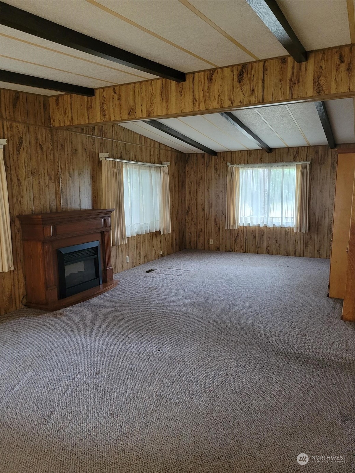 119-13 Peterson Road, Unit 13 Chehalis, WA 98532 - Photo 20 of 31 a view of a room with a fireplace and window