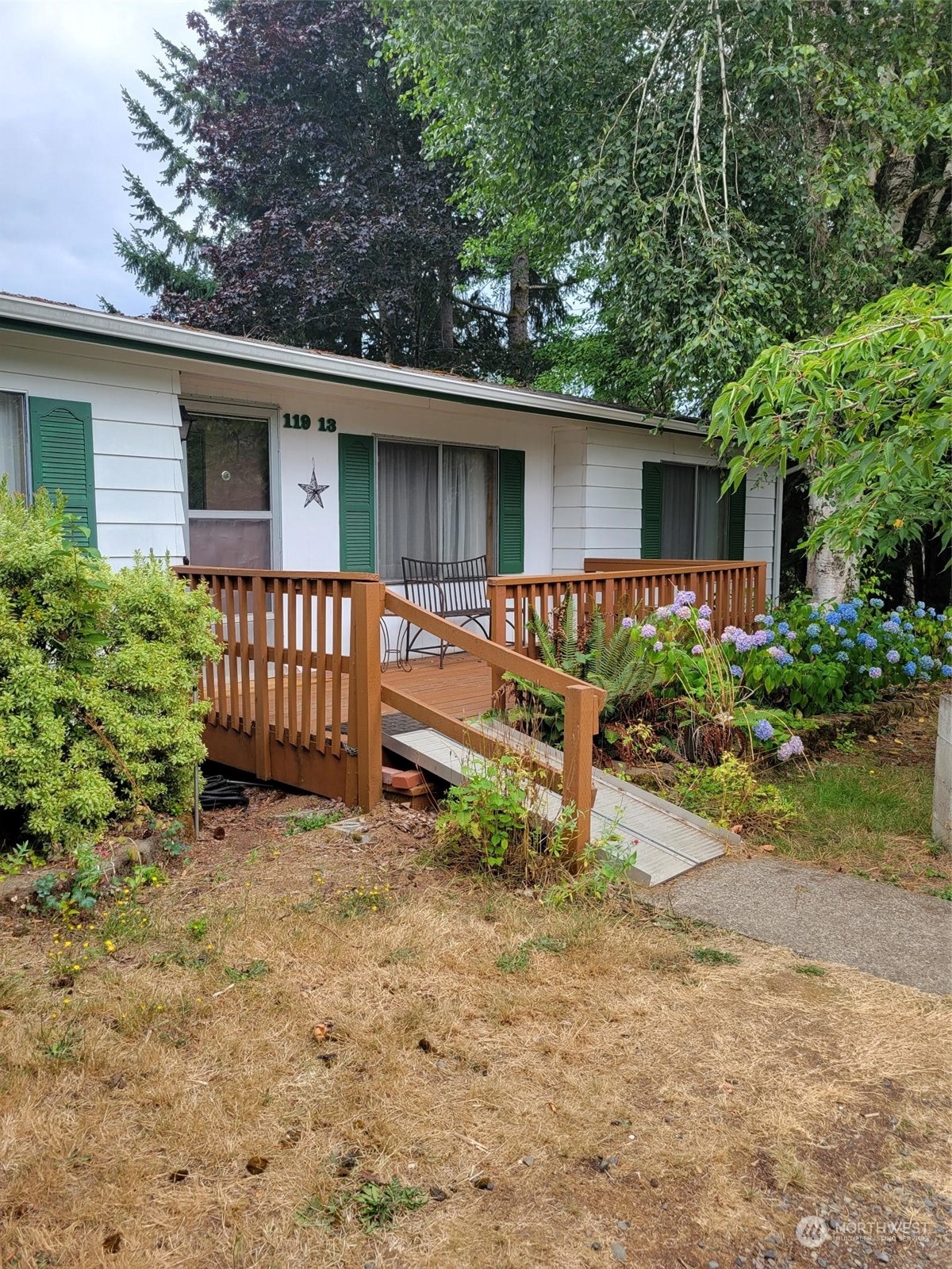 119-13 Peterson Road, Unit 13 Chehalis, WA 98532 - Photo 2 of 31 front view of a house with a yard
