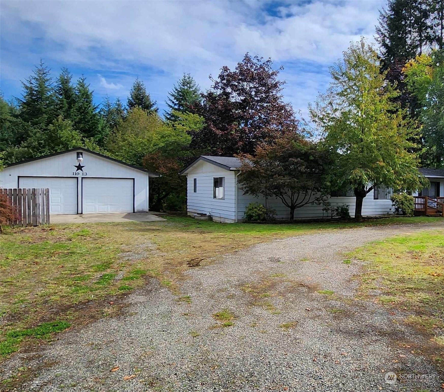 119-13 Peterson Road, Unit 13 Chehalis, WA 98532 - Photo 3 of 31 a house with trees in front of it