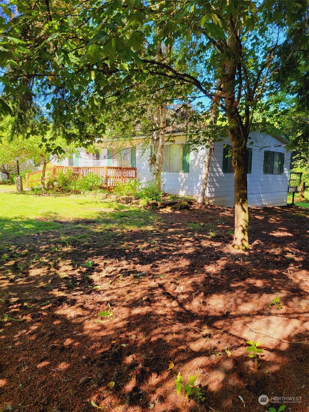 119-13 Peterson Road, Unit 13 Chehalis, WA 98532 - Photo 31 of 31 a view of a house with a yard
