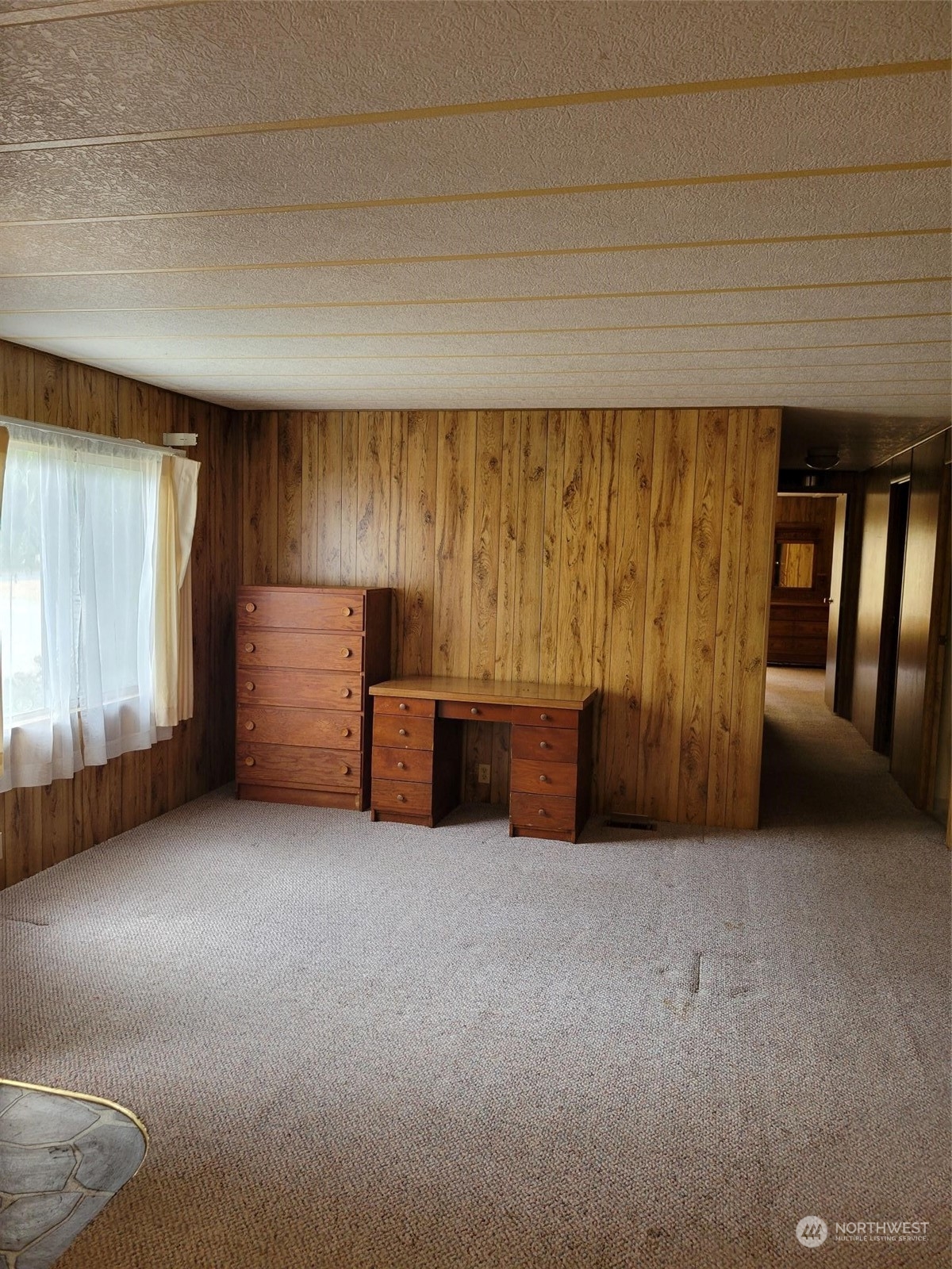 119-13 Peterson Road, Unit 13 Chehalis, WA 98532 - Photo 4 of 31 a view of an empty room with a fireplace