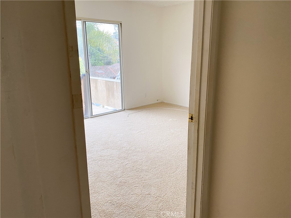 34072 Mazo Drive Dana Point, CA 92629 - Photo 21 of 73 Upper unit's front bedroom, also showing doors to upper deck