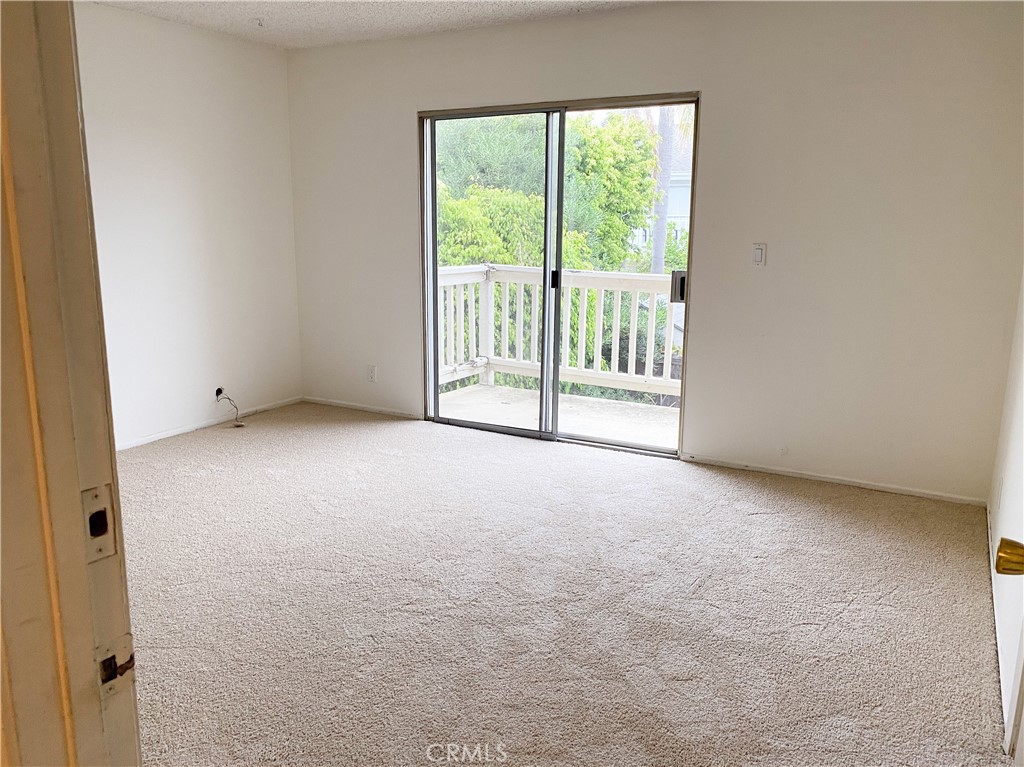 34072 Mazo Drive Dana Point, CA 92629 - Photo 36 of 73 Upper unit's master bedroom, with patio dooors to wrap-around rear deck