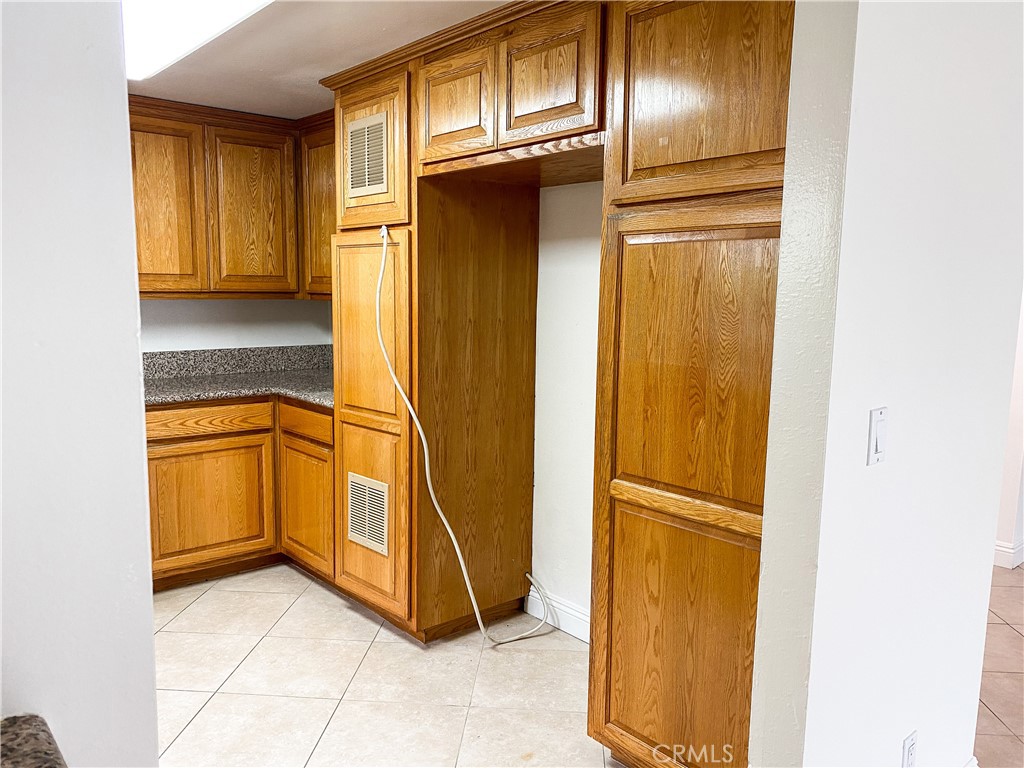 34072 Mazo Drive Dana Point, CA 92629 - Photo 54 of 73 a view of walk in closet with empty racks