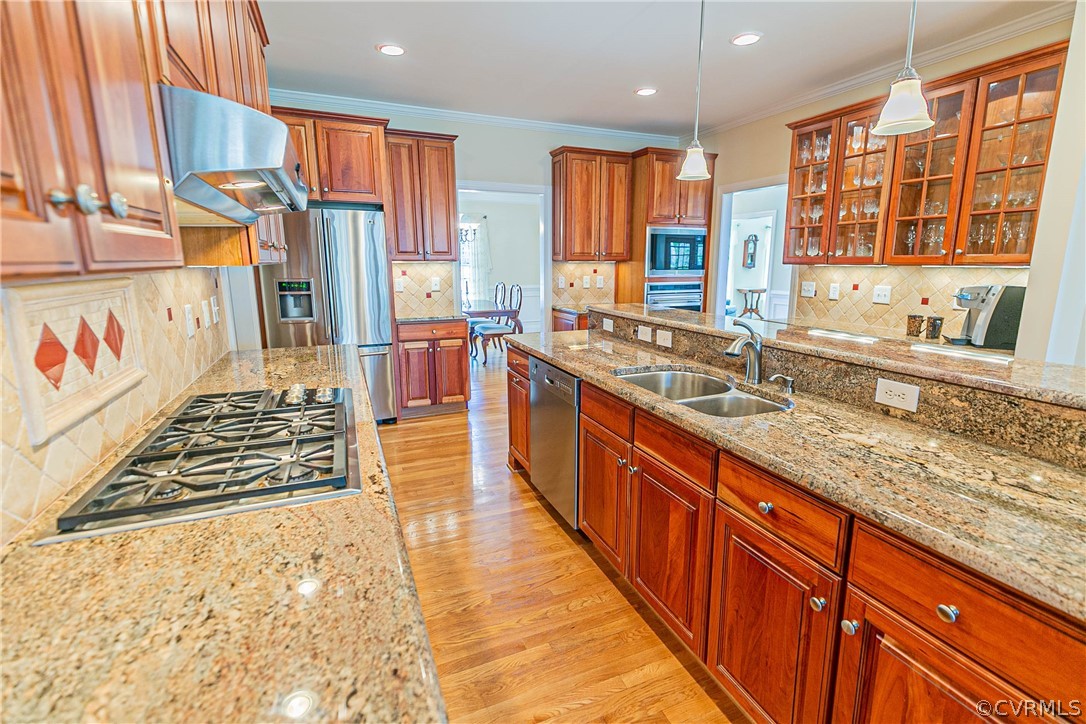 10180 Scots Landing Road Mechanicsville, VA 23116 - Photo 23 of 50 a large kitchen with stainless steel appliances a large window and counter space