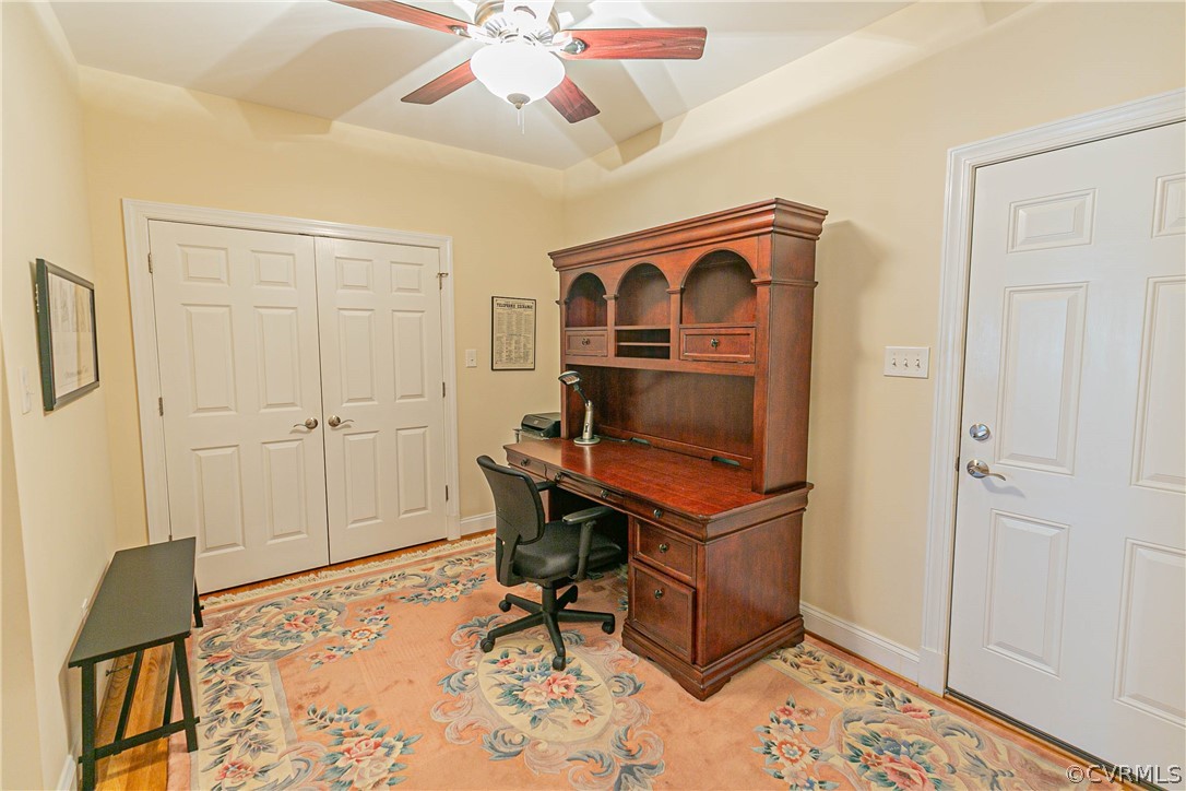 10180 Scots Landing Road Mechanicsville, VA 23116 - Photo 26 of 50 a room with chandelier fan and wooden floor