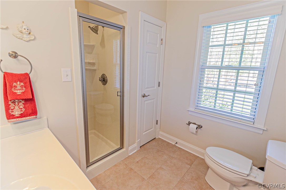 10180 Scots Landing Road Mechanicsville, VA 23116 - Photo 36 of 50 a bathroom with a toilet sink and a shower