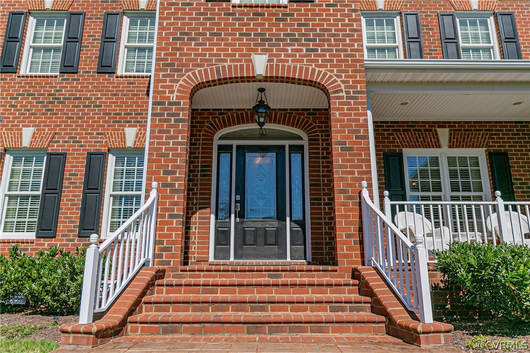 10180 Scots Landing Road Mechanicsville, VA 23116 - Photo 4 of 50 a front view of a house with a front door