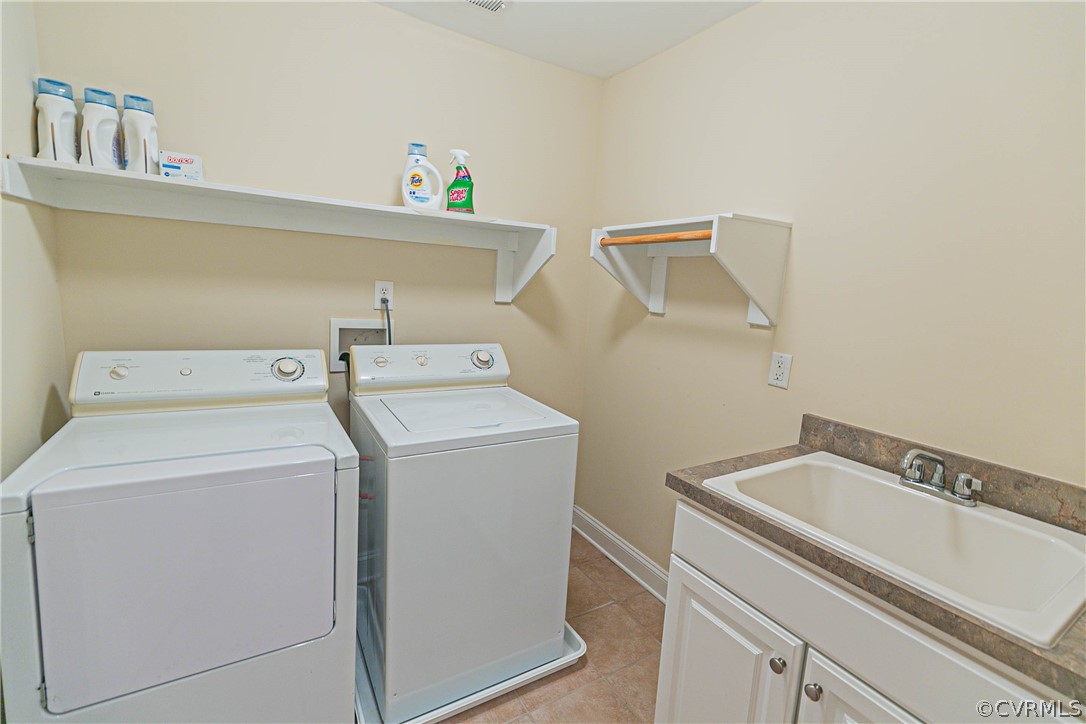10180 Scots Landing Road Mechanicsville, VA 23116 - Photo 45 of 50 a utility room with dryer and washer