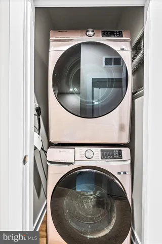 a bed room with a bed and a window