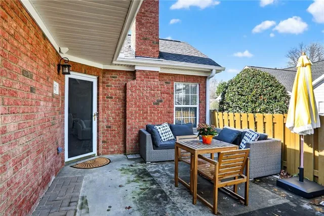 a outdoor living space with furniture and garden view