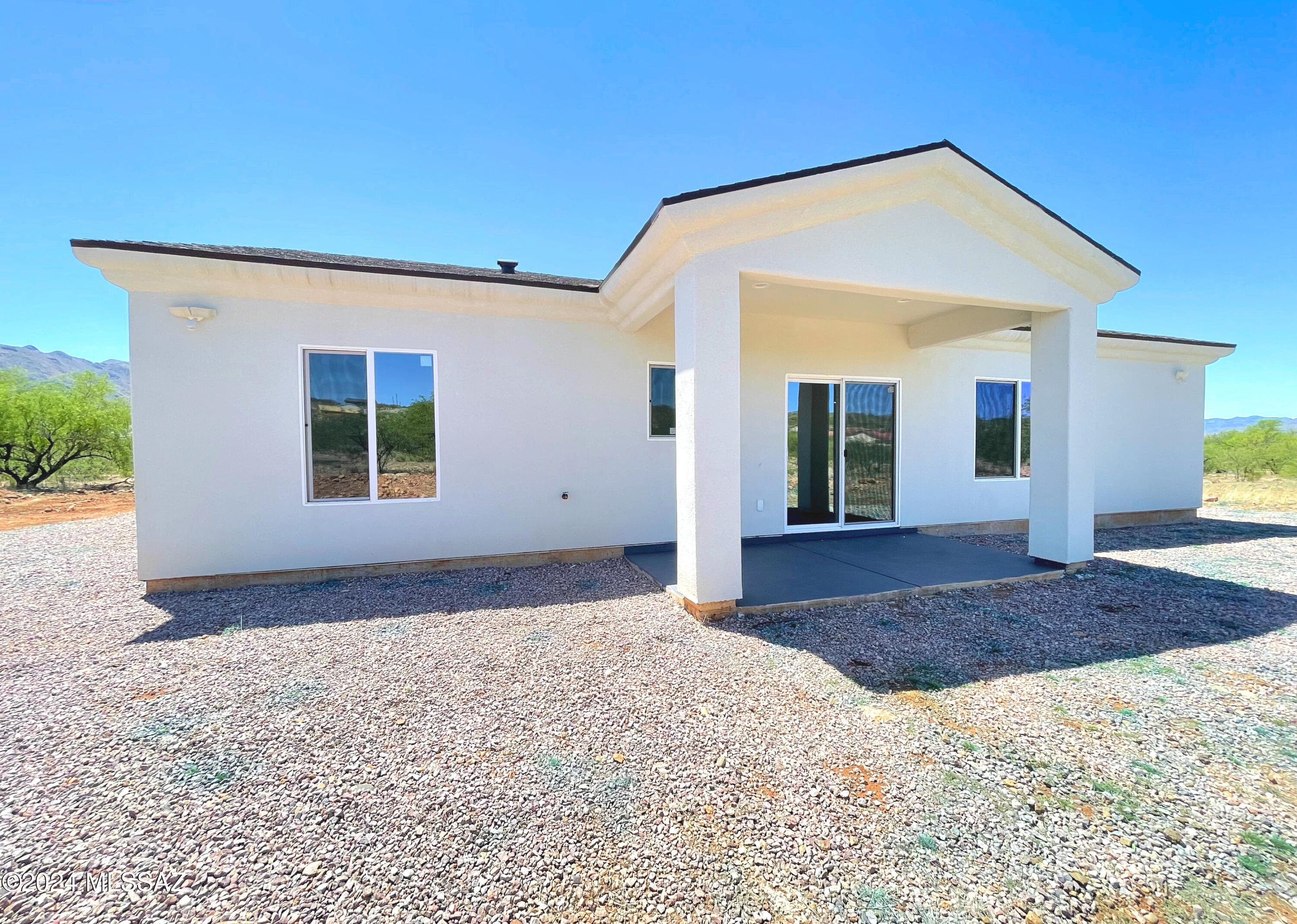 1835 San Diego Court Rio Rico, AZ 85648 - Photo 17 of 19 a view of a house with a yard